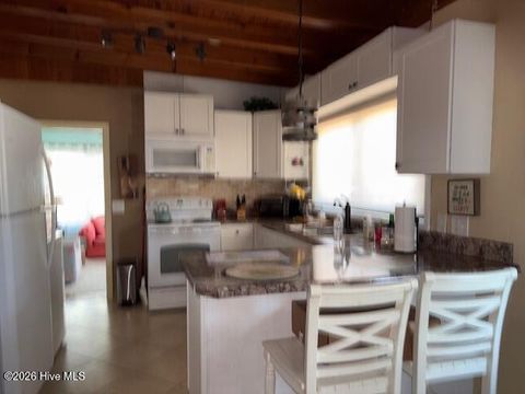Tiny photo for 313 Mercer Street, Oak Island, NC 28465 (MLS # 100563343)