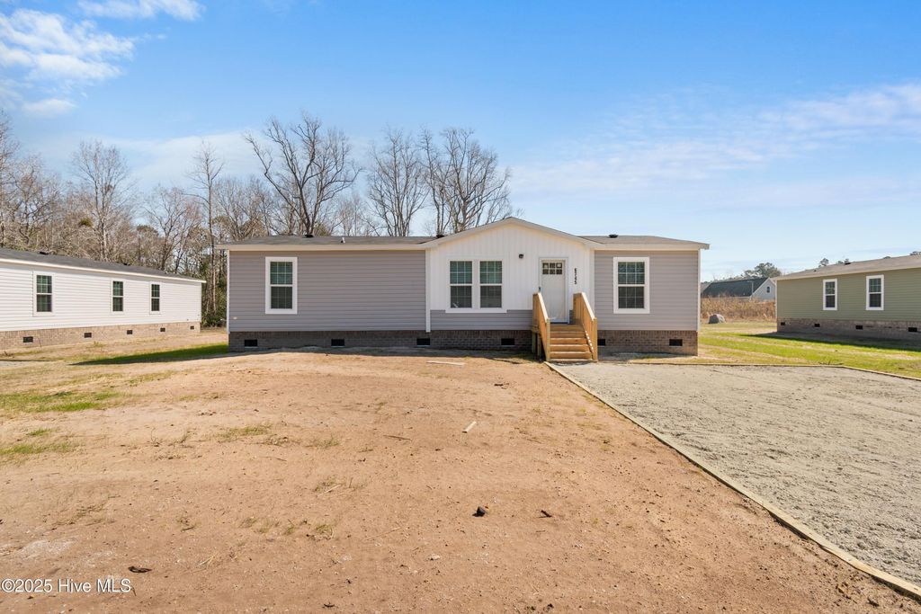 Photo of 6745 Lewis Drive SE, Winnabow, NC 28479 (MLS # 100523771)