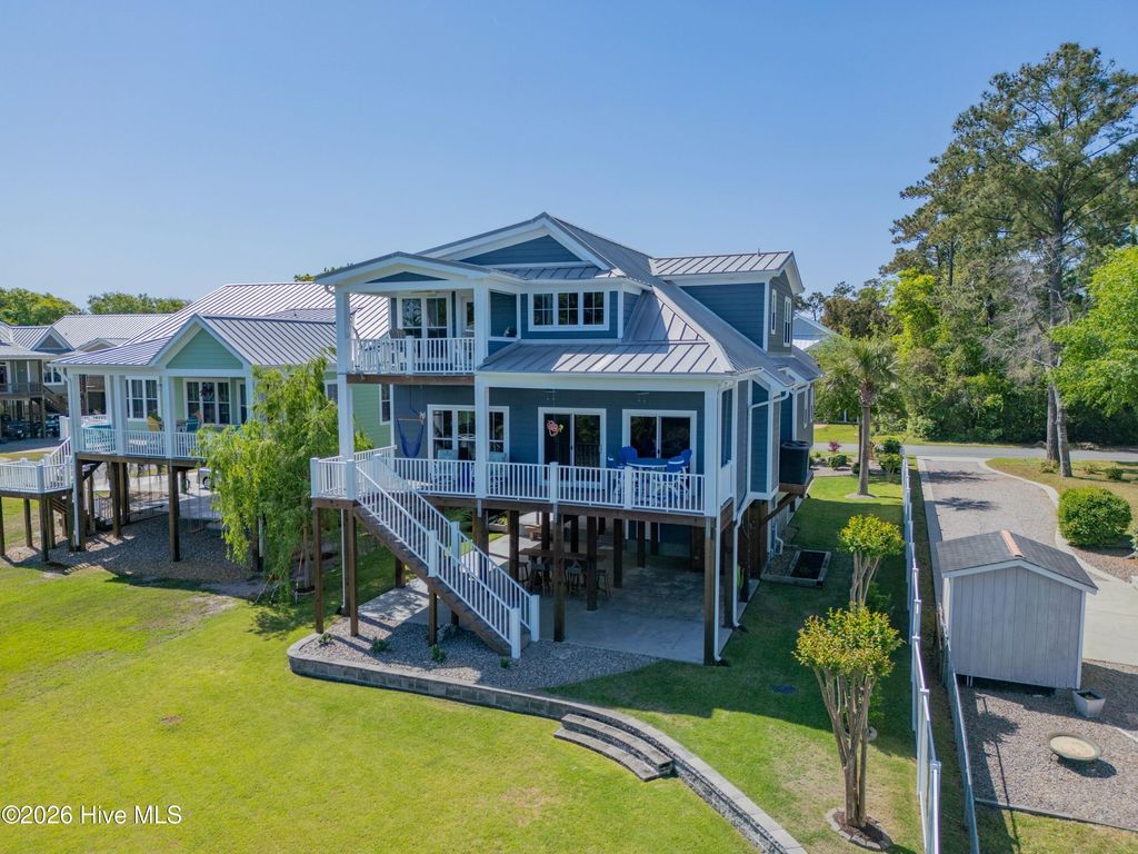 Photo of 6308 E Yacht Drive, Oak Island, NC 28465 (MLS # 100569369)