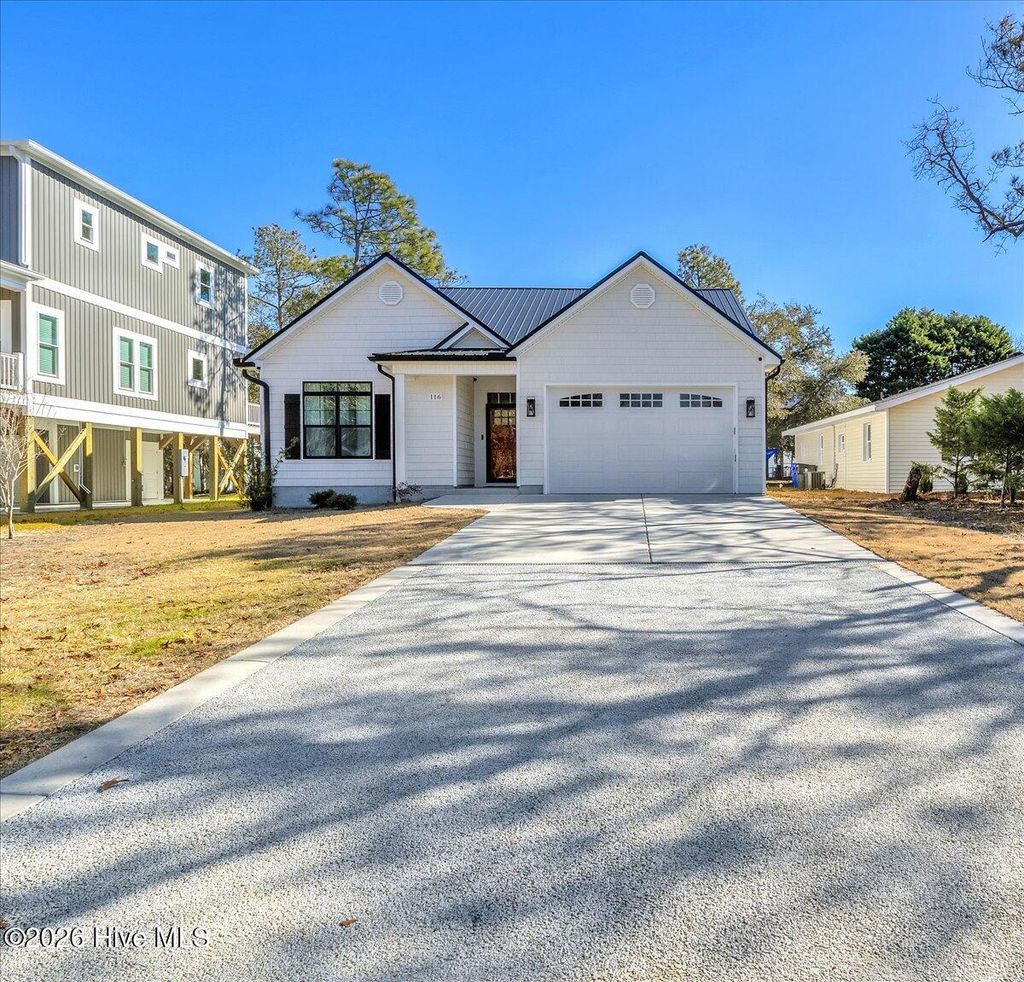 Photo of 116 NW 14th Street, Oak Island, NC 28465 (MLS # 100552263)