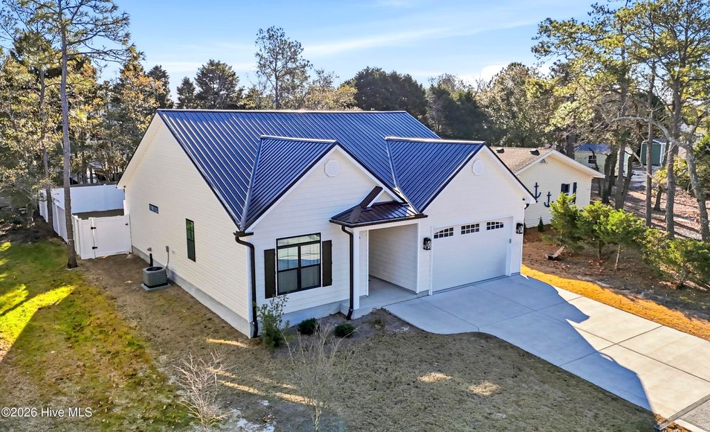 Photo of 116 NW 14th Street, Oak Island, NC 28465 (MLS # 100552263)