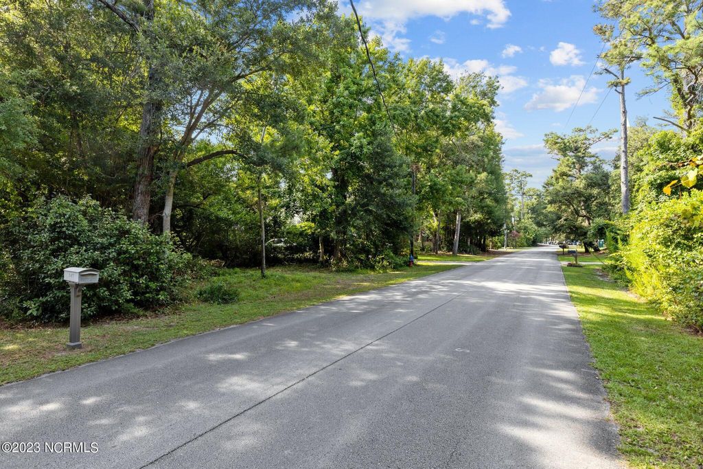 Photo of 149 Arborvitae Drive, Pine Knoll Shores, NC 28512 (MLS # 100396196)