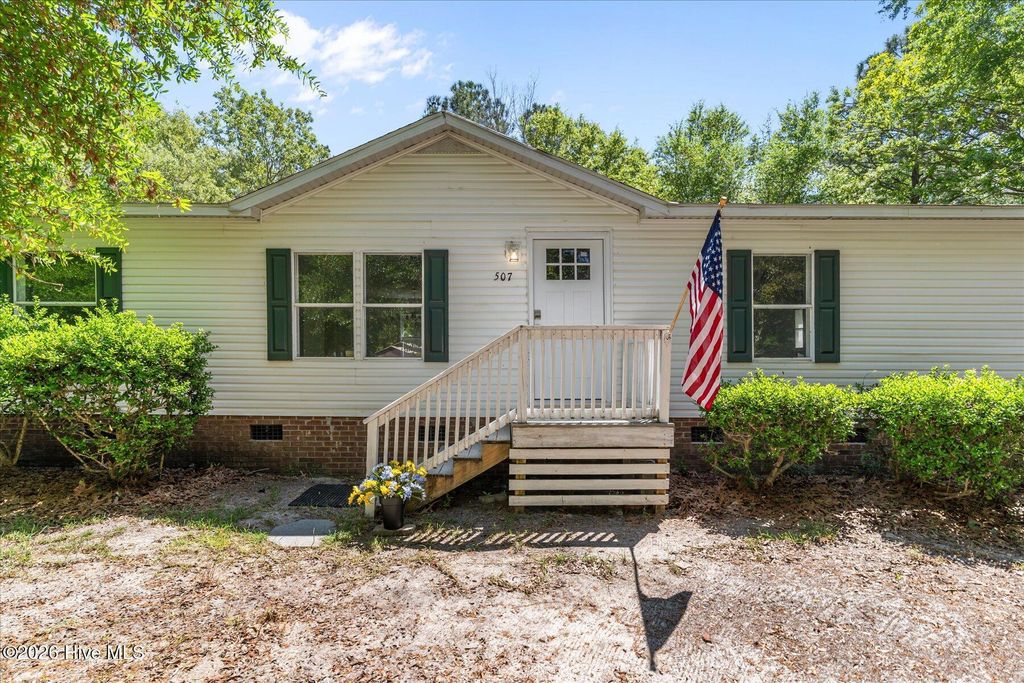 Photo of 507 Mulligan Way SE, Bolivia, NC 28422 (MLS # 100567568)