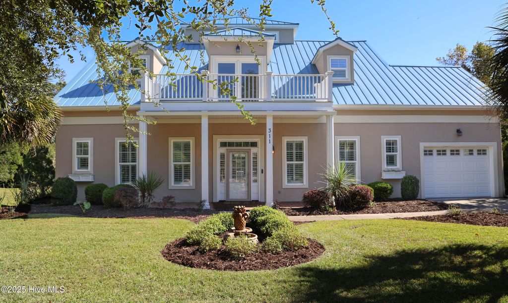 Photo of 311 S Kingfisher Lane, Hampstead, NC 28443 (MLS # 100537477)