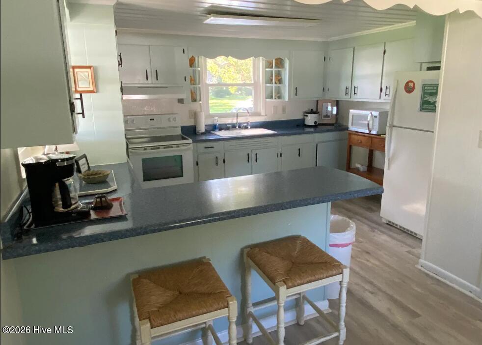 Photo of 1300 Beach Drive SW, Calabash, NC 28467 (MLS # 100603887)