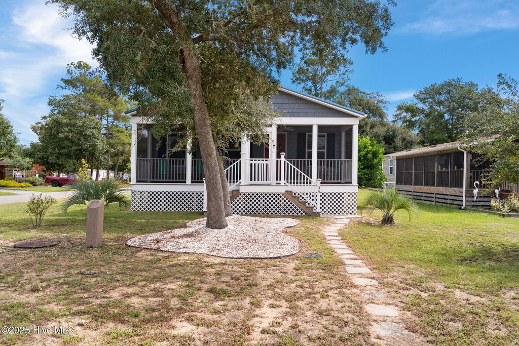 Photo of 138 NE 74th Street, Oak Island, NC 28465 (MLS # 100529995)