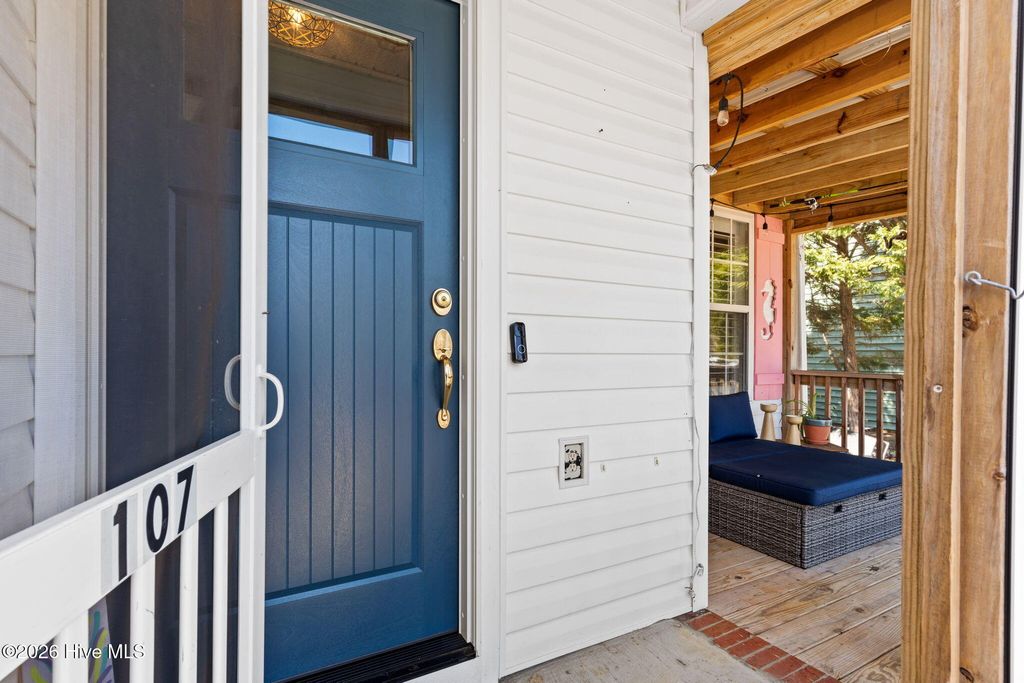 Photo of 107 NW 16th Street, Oak Island, NC 28465 (MLS # 100559319)