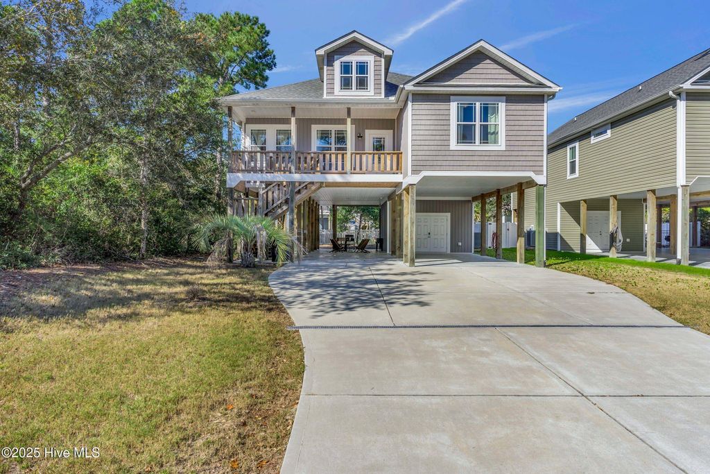 Photo of 129 NE 39th Street, Oak Island, NC 28465 (MLS # 100537847)