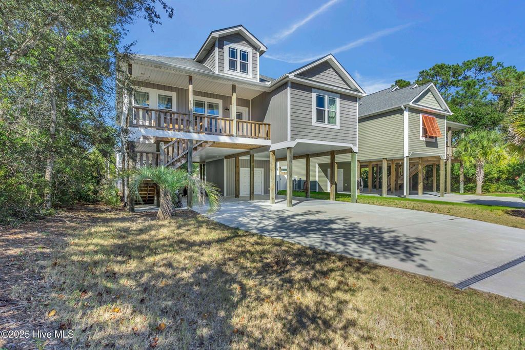 Photo of 129 NE 39th Street, Oak Island, NC 28465 (MLS # 100537847)