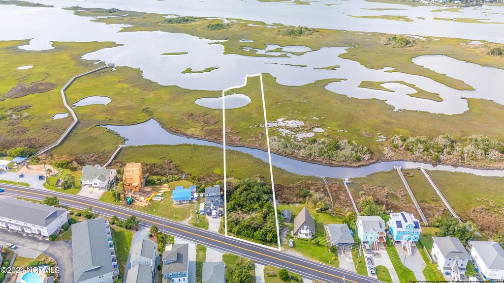 Photo of 817 S Topsail Drive, Surf City, NC 28445 (MLS # 100433786)