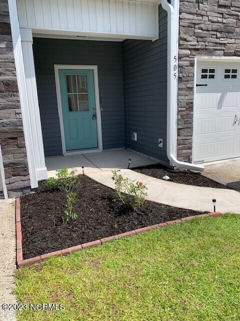 Photo of 505 Stone Crab Lane, Sneads Ferry, NC 28460 (MLS # 100605426)