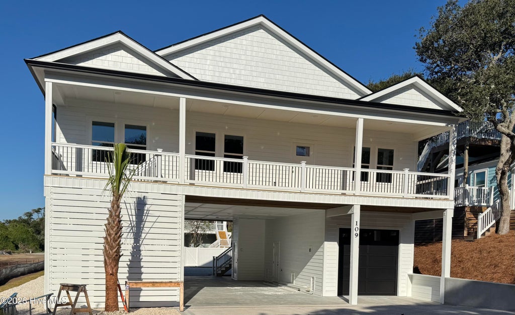 Photo of 109 SE 37th Street, Oak Island, NC 28465 (MLS # 100607704)