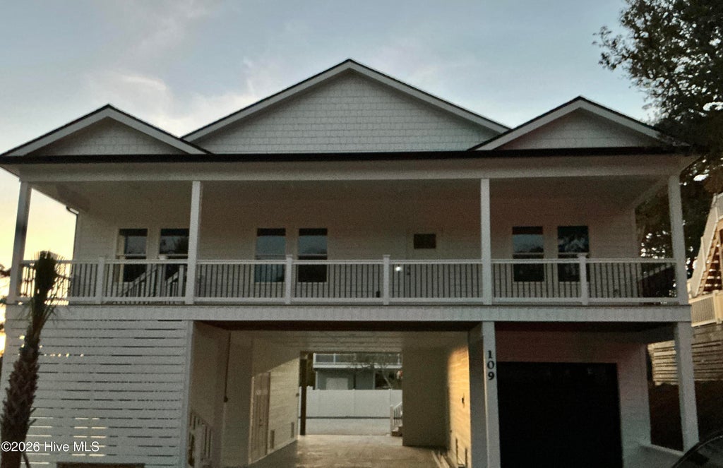 Photo of 109 SE 37th Street, Oak Island, NC 28465 (MLS # 100607704)
