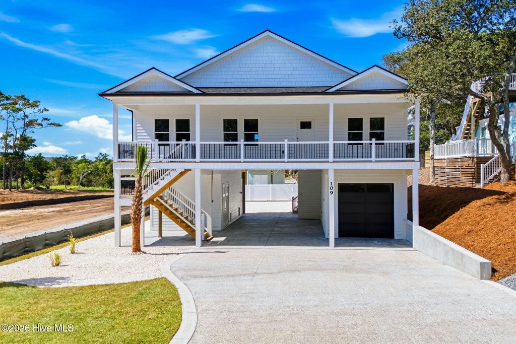 Photo of 109 SE 37th Street, Oak Island, NC 28465 (MLS # 100607704)