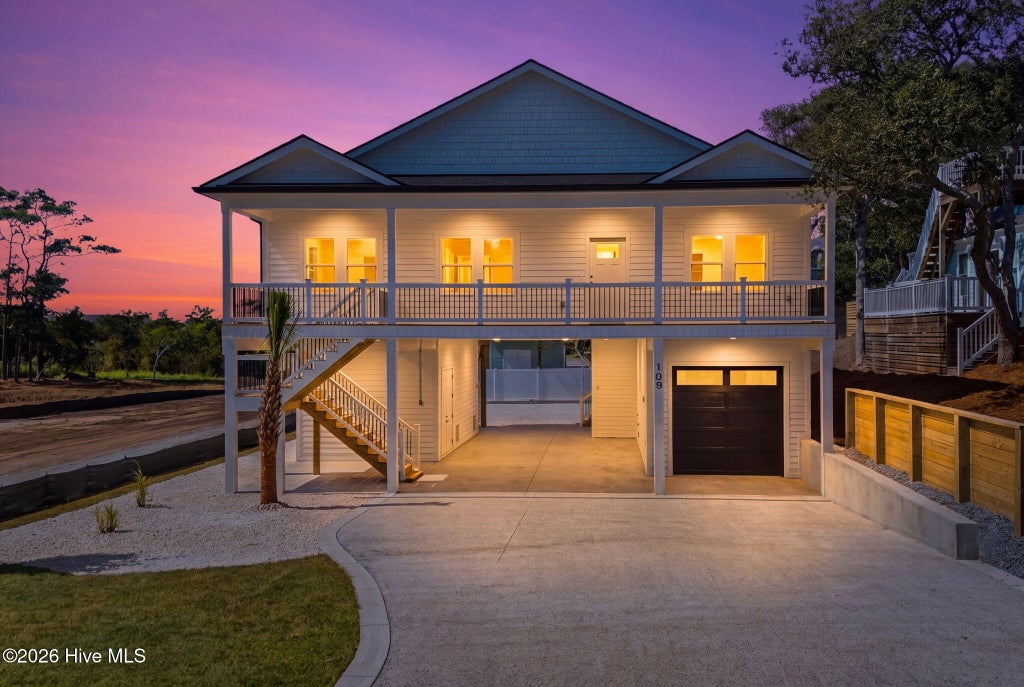 Photo of 109 SE 37th Street, Oak Island, NC 28465 (MLS # 100607704)