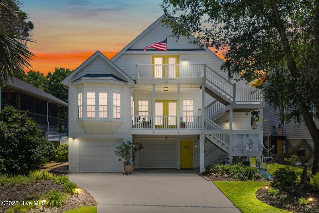 Photo of 104 NE 27th Street, Oak Island, NC 28465 (MLS # 100514945)