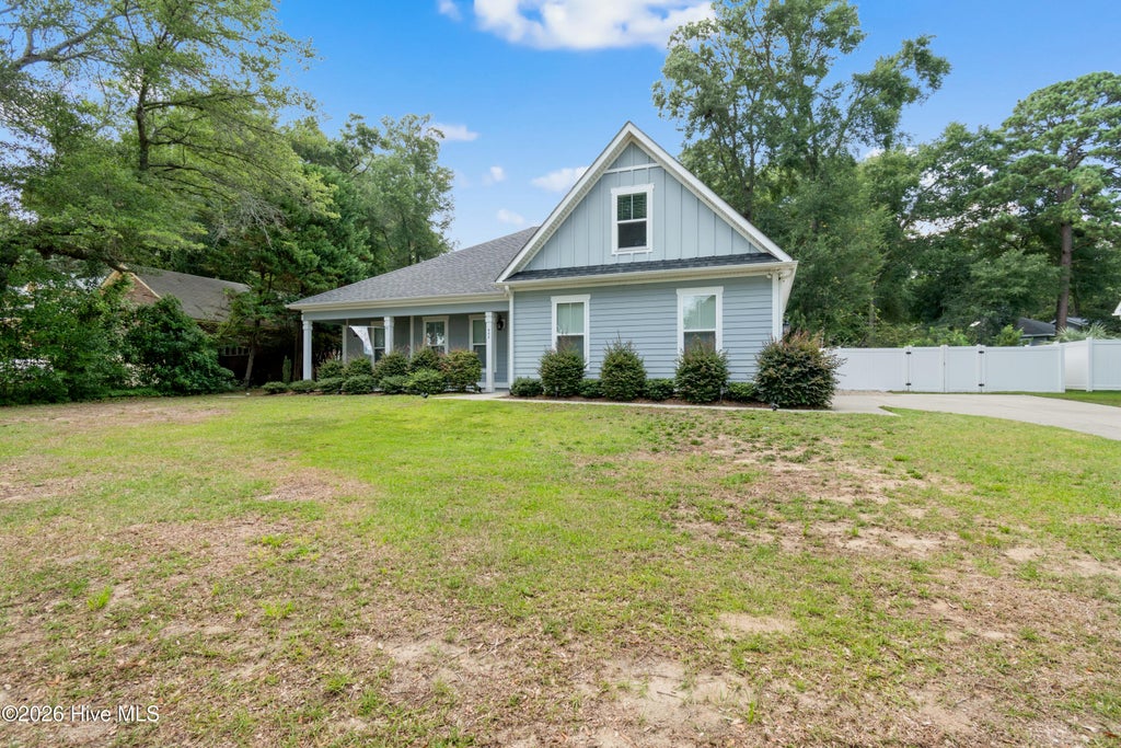 Photo of 444 Lake Shore Drive, Sunset Beach, NC 28468 (MLS # 100583093)