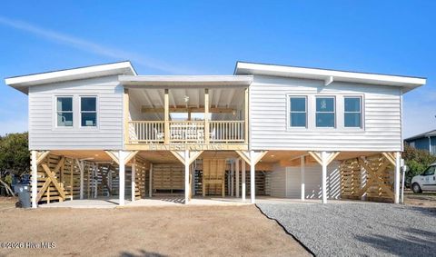Photo of 3929 W Dolphin Drive, Oak Island, NC 28465 (MLS # 100566197)