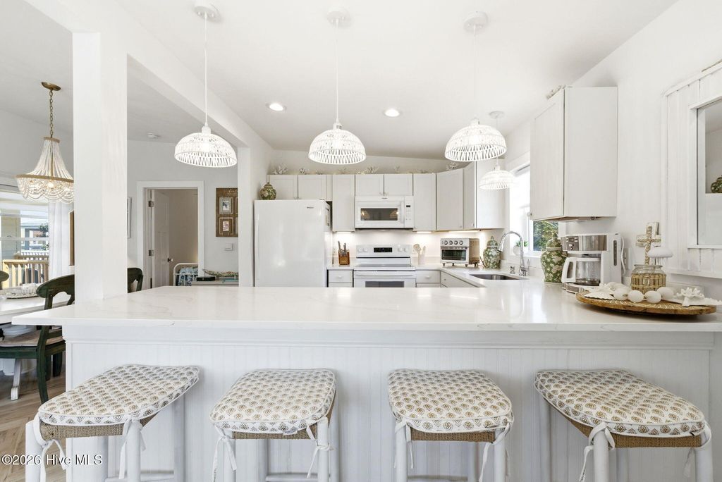 Photo of 3929 W Dolphin Drive, Oak Island, NC 28465 (MLS # 100566197)