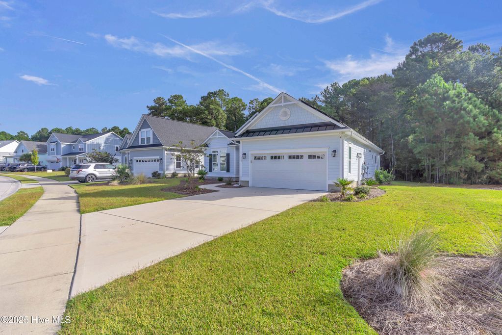 Photo of 547 Moss Lake Lane, Holly Ridge, NC 28445 (MLS # 100535117)