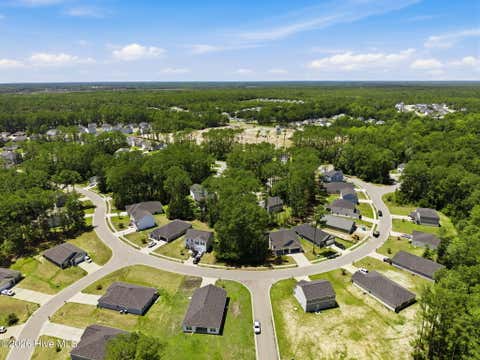 Photo of 2614 Provence Drive SE, Bolivia, NC 28422 (MLS # 100594403)