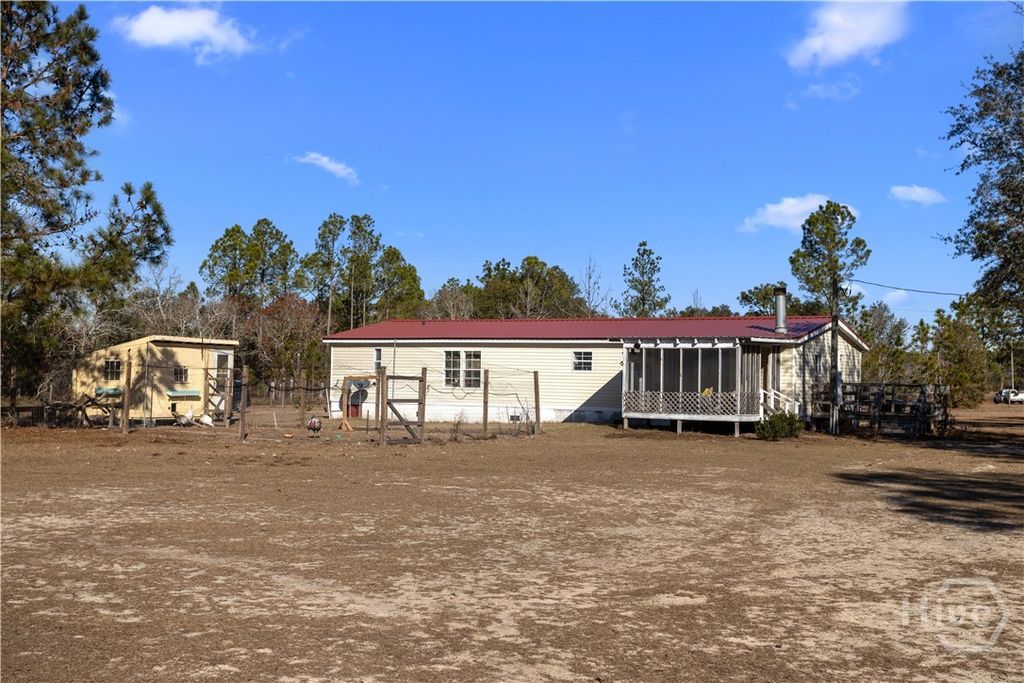 Photo of 585 Brangus Lane, Collins, GA 30421 (MLS # SA345468)