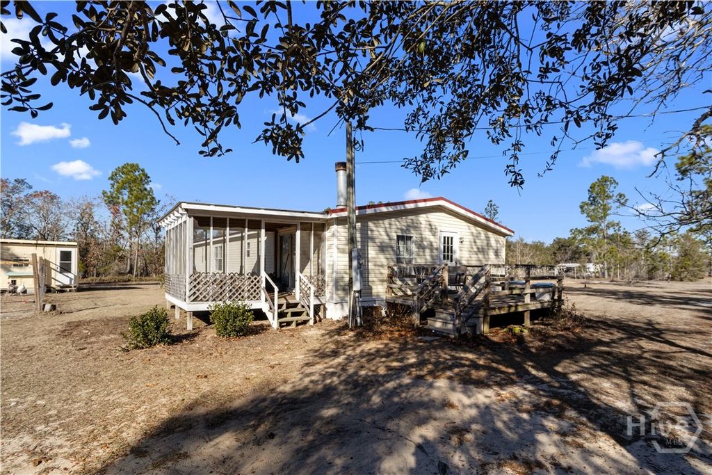 Photo of 585 Brangus Lane, Collins, GA 30421 (MLS # SA345468)