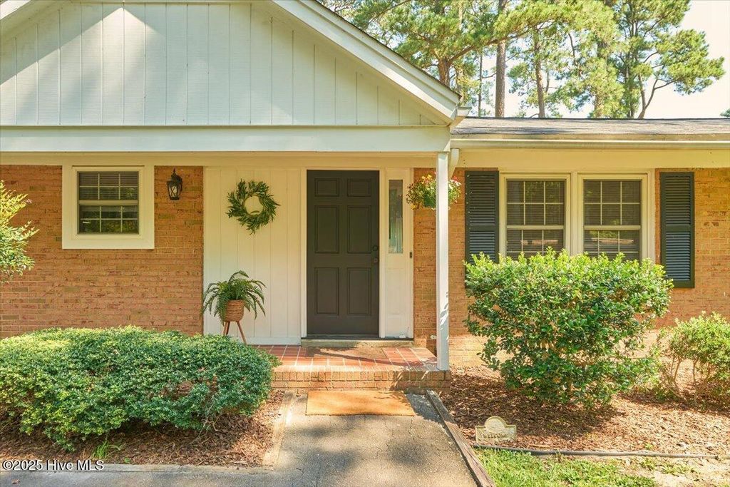 Photo of 26 S Lakeshore Drive, Whispering Pines, NC 28327 (MLS # 100531726)