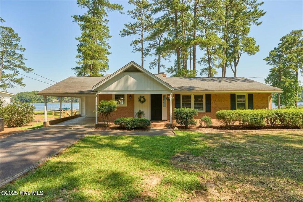 Photo of 26 S Lakeshore Drive, Whispering Pines, NC 28327 (MLS # 100531726)