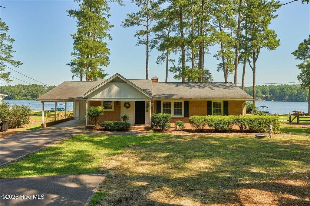 Photo of 26 S Lakeshore Drive, Whispering Pines, NC 28327 (MLS # 100531726)