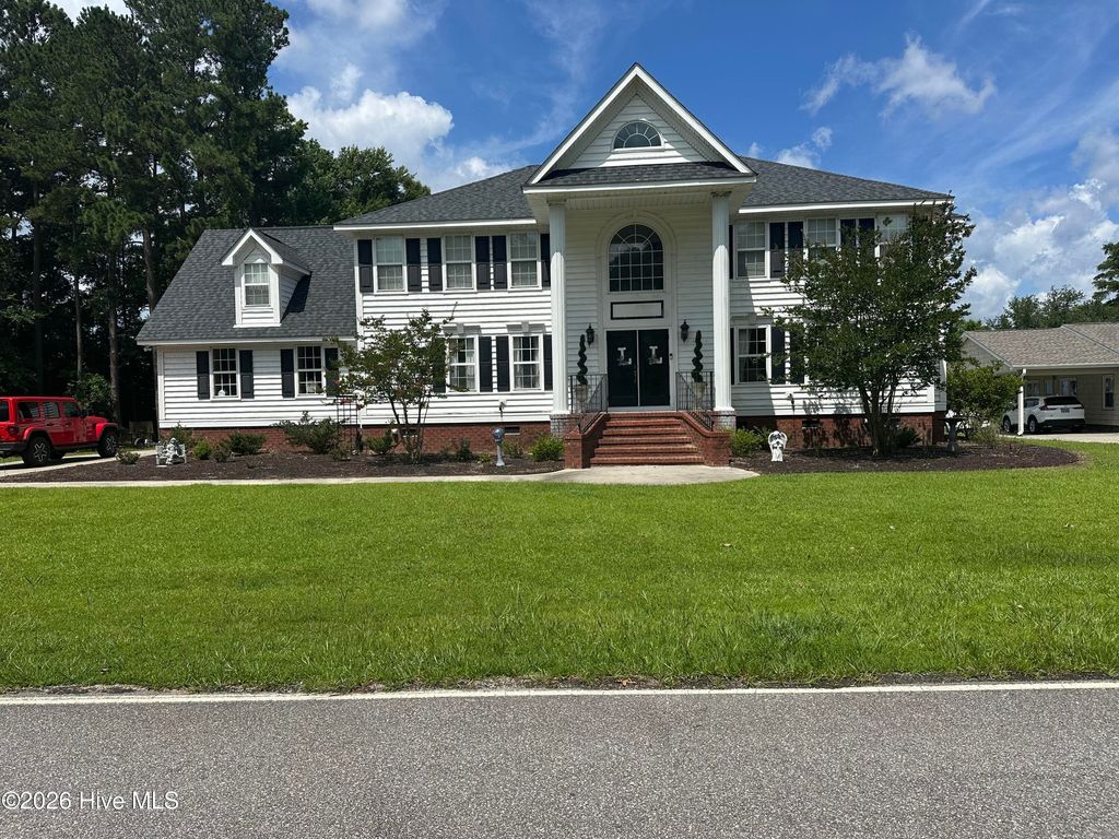 Photo of 2770 Bella Coola Road, Lake Waccamaw, NC 28450 (MLS # 100552030)