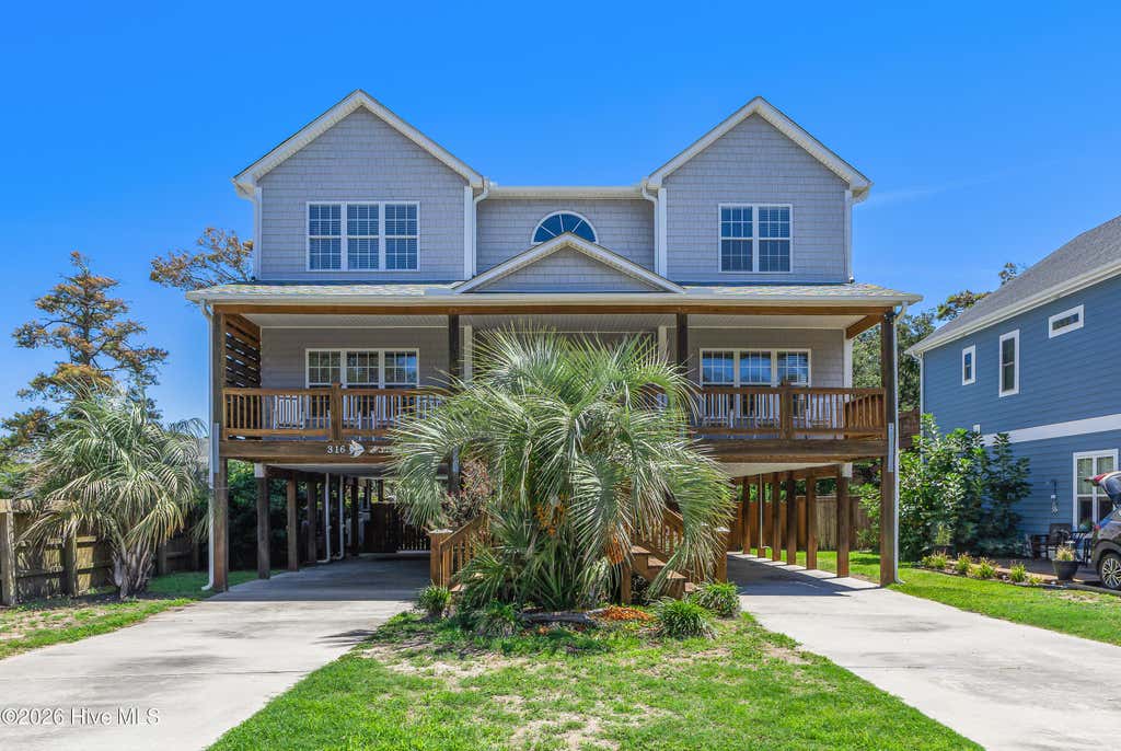 Photo of 316 SE 79th Street, Oak Island, NC 28465 (MLS # 100595759)