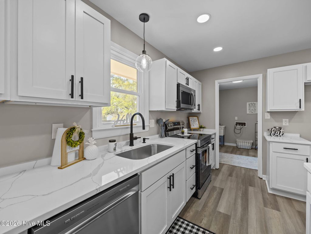 Photo of 412 Crows Nest Lane, Sneads Ferry, NC 28460 (MLS # 100562789)