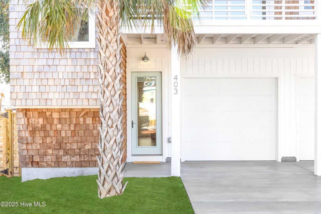 Photo of 403 Wilson Avenue, Carolina Beach, NC 28428 (MLS # 100544003)