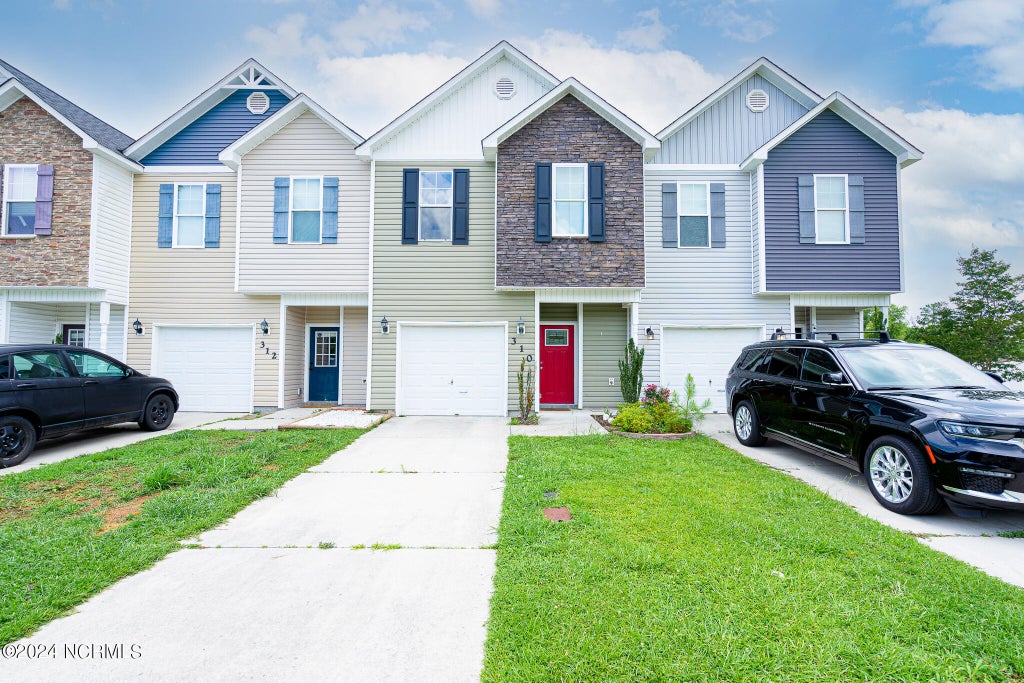 Photo of 310 Cedar Island Trail, Holly Ridge, NC 28445 (MLS # 100605540)