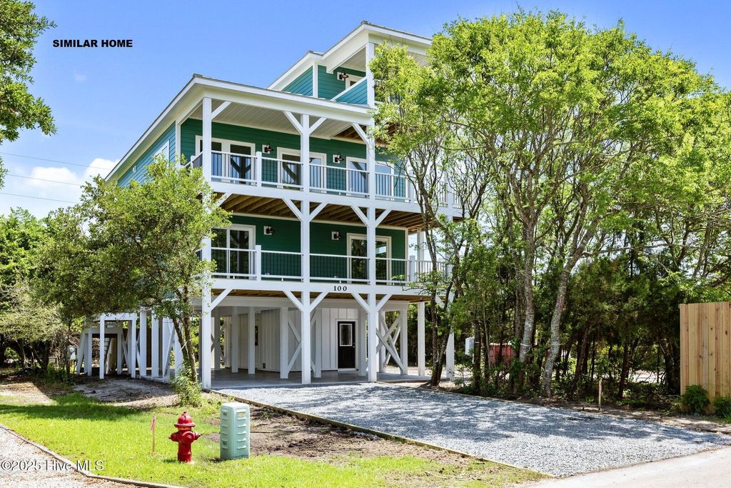 Photo of 1202 N Topsail Drive, Surf City, NC 28445 (MLS # 100508414)