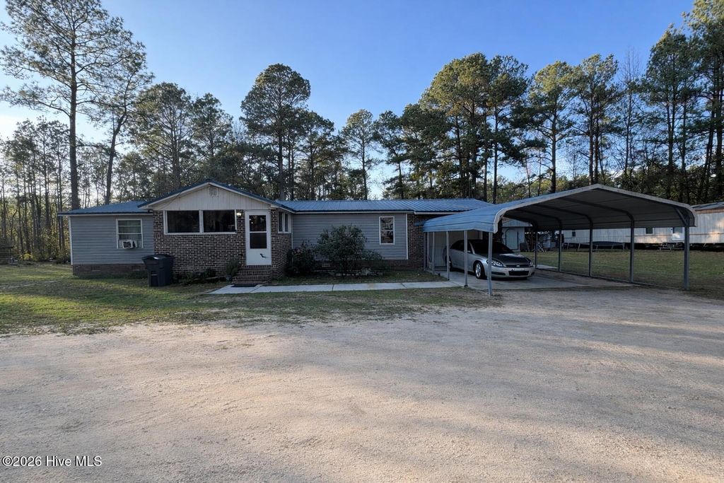 Photo of 8801 Johns Mill Road, Maxton, NC 28364 (MLS # 100564308)