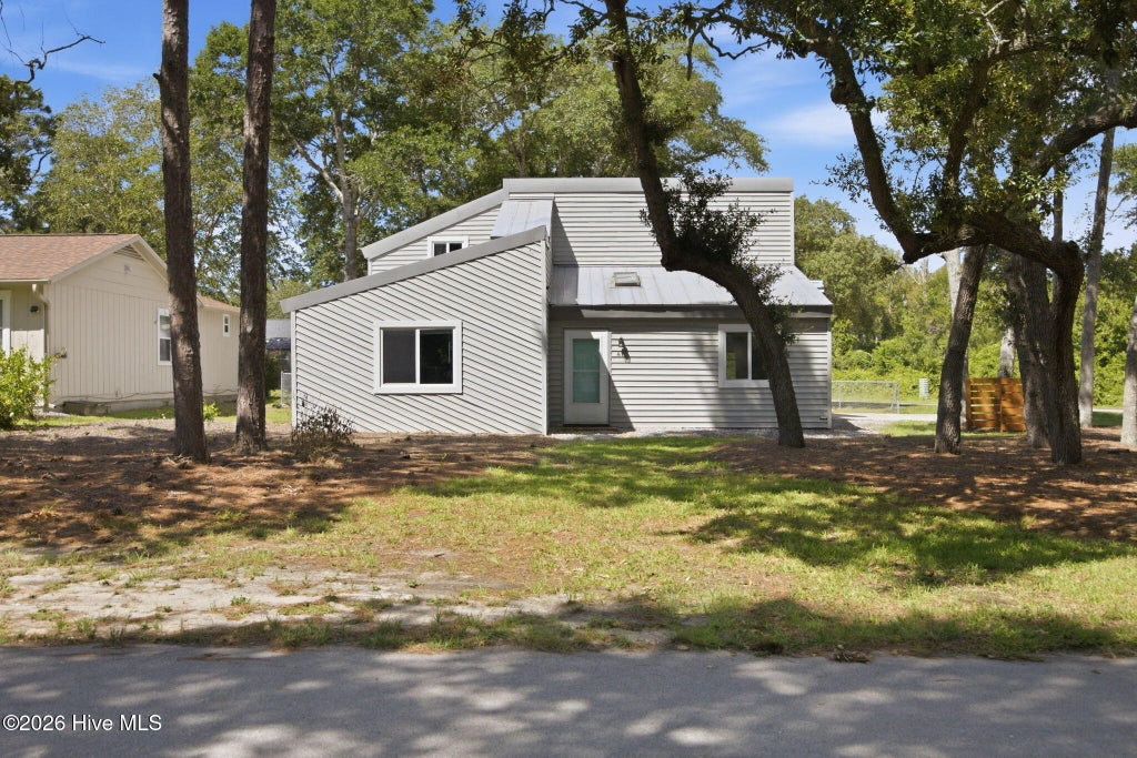 Photo of 417 Sellers Street, Oak Island, NC 28465 (MLS # 100601325)