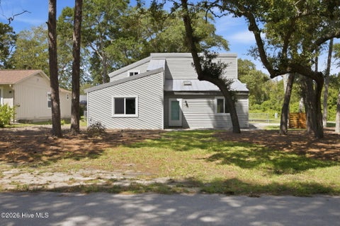 Photo of 417 Sellers Street, Oak Island, NC 28465 (MLS # 100601325)