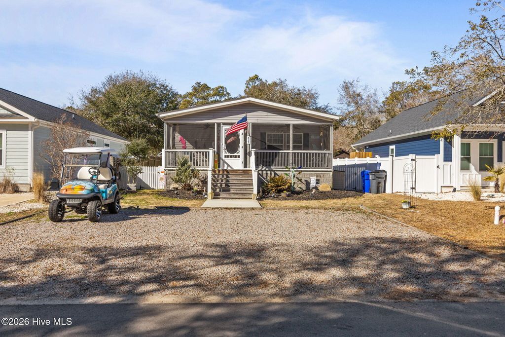 Photo of 217 NE 75th Street, Oak Island, NC 28465 (MLS # 100554450)