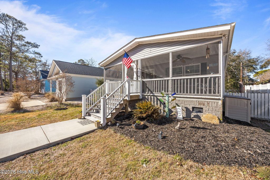 Photo of 217 NE 75th Street, Oak Island, NC 28465 (MLS # 100554450)