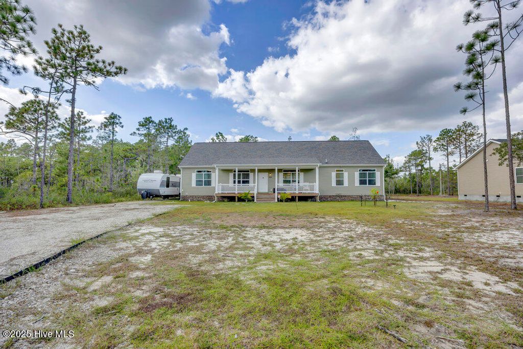 Photo of 349 Fifty Lakes Drive, Southport, NC 28461 (MLS # 100534128)