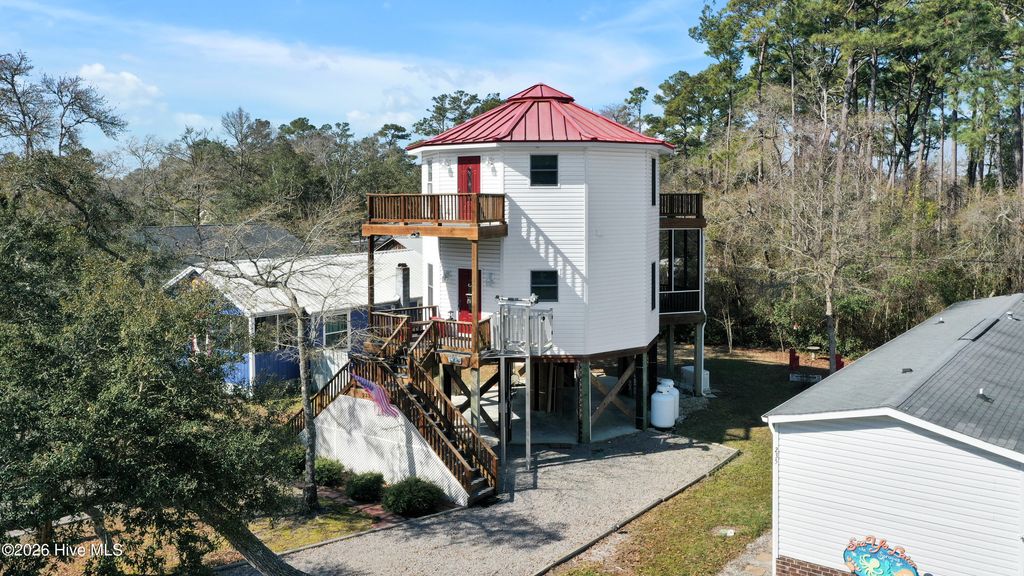 Photo of 233 NE 75th Street, Oak Island, NC 28465 (MLS # 100562809)
