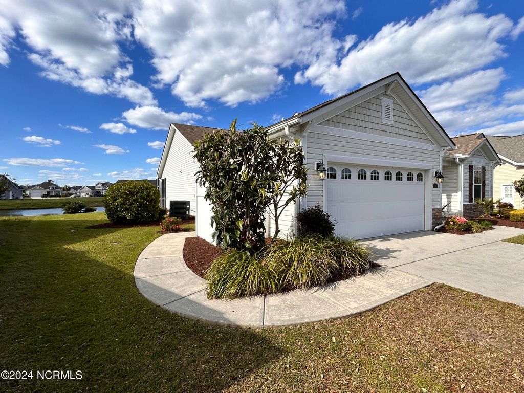 Photo of 642 W Chatman Drive NW, Calabash, NC 28467 (MLS # 100550059)