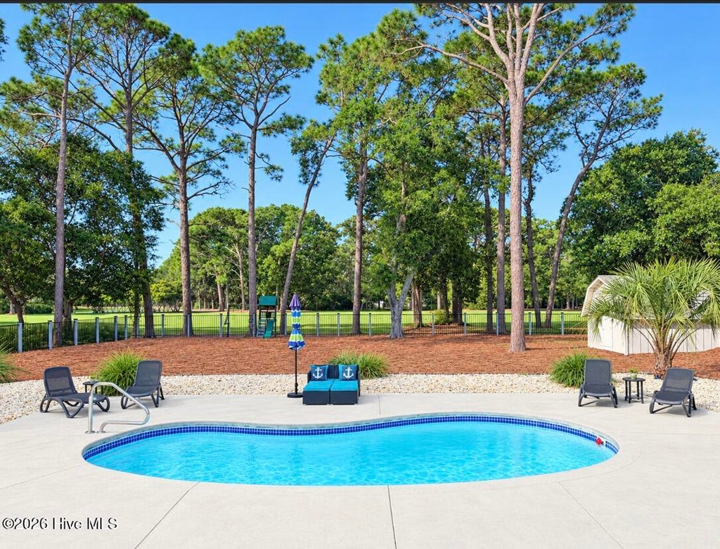 Photo of 32 Yaupon Way, Oak Island, NC 28465 (MLS # 100610453)