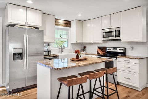 Tiny photo for 32 Yaupon Way, Oak Island, NC 28465 (MLS # 100610453)