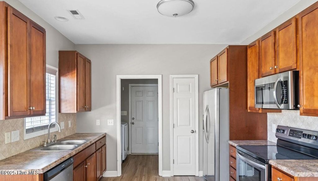Photo of 303 Elk Court, Jacksonville, NC 28546 (MLS # 100577475)