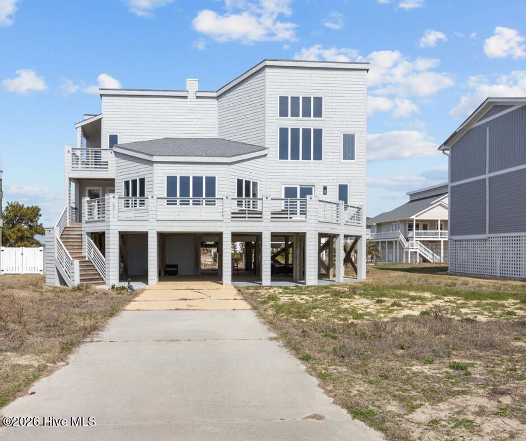 Photo of 6618 W Beach Drive, Oak Island, NC 28465 (MLS # 100557816)
