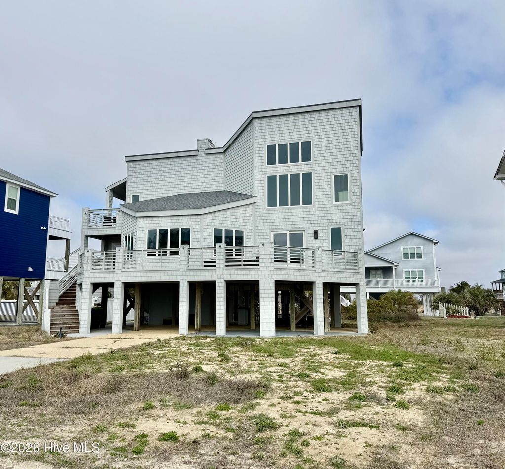 Photo of 6618 W Beach Drive, Oak Island, NC 28465 (MLS # 100557816)