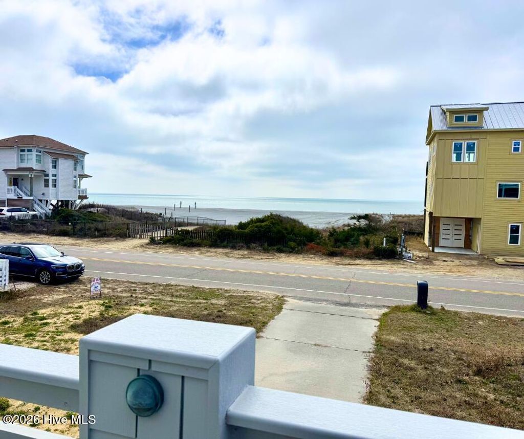 Photo of 6618 W Beach Drive, Oak Island, NC 28465 (MLS # 100557816)